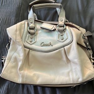 White and silver coach purse